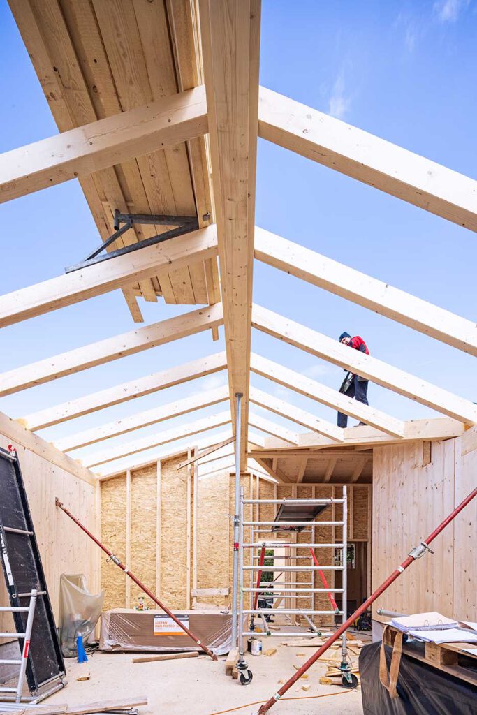 Wohnraum Hochformat Holzhaus Weyregg